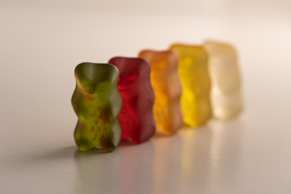 a row of gummy bears sitting on top of a table