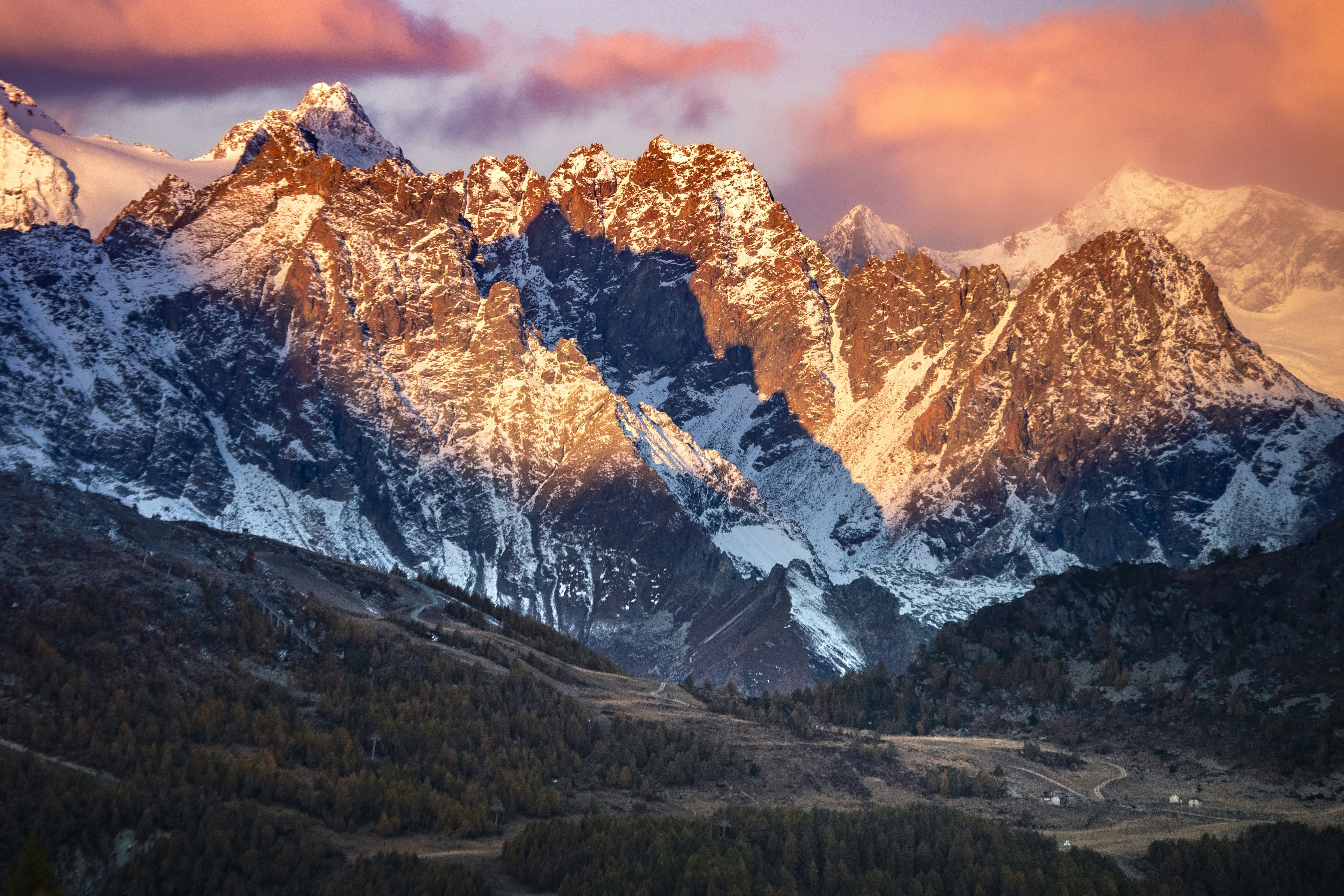 a mountain range with snow on the top of it