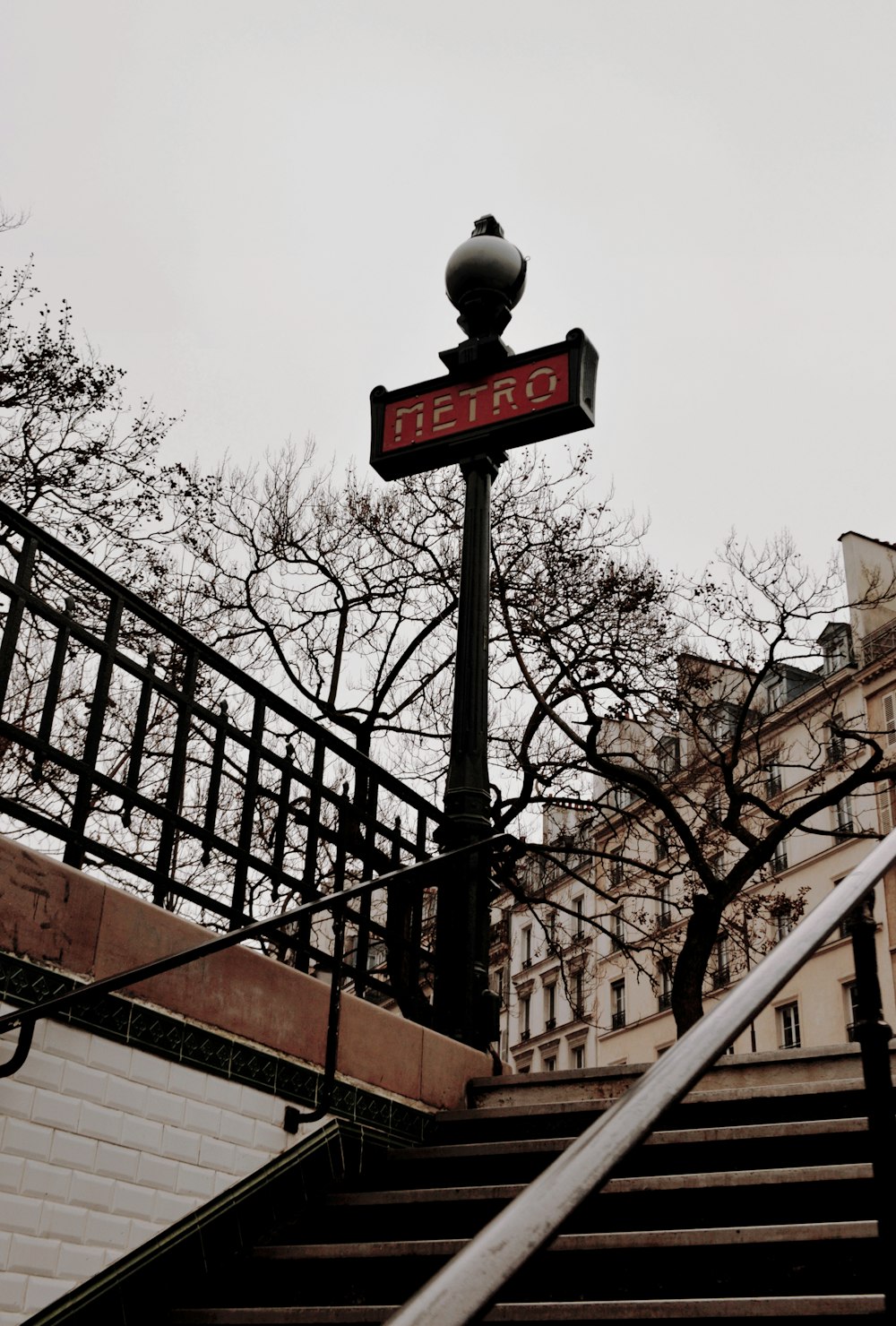 a street sign sitting on top of a metal pole