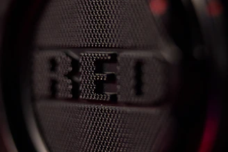 Close-up of a premium promotional item showing tactile UV raised printing detail.