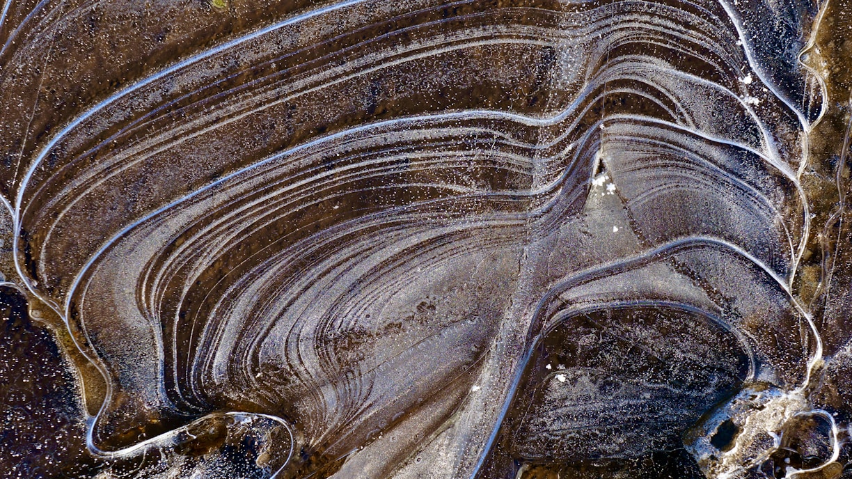 an aerial view of a rock formation in the desert