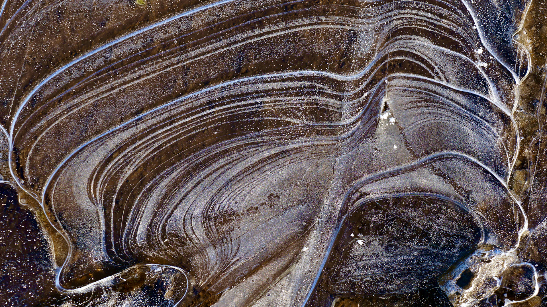 an aerial view of a rock formation in the desert