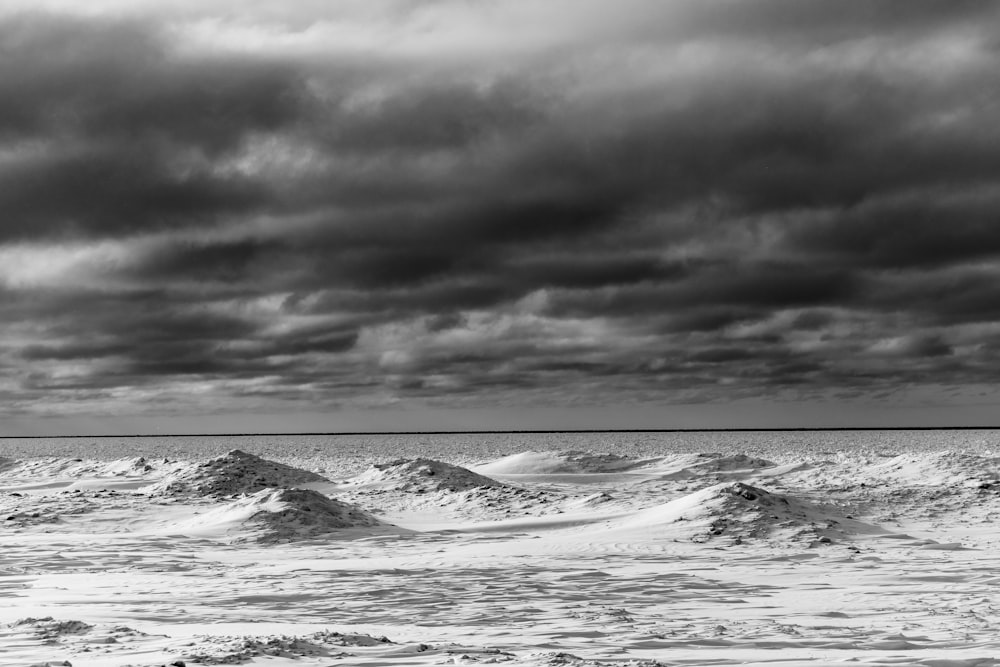 a black and white photo of the ocean