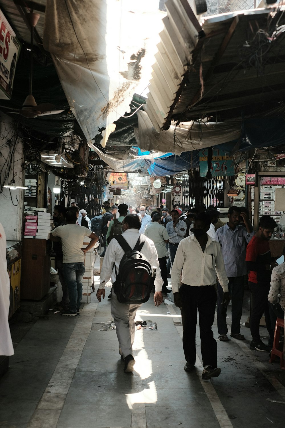 a group of people walking down a street