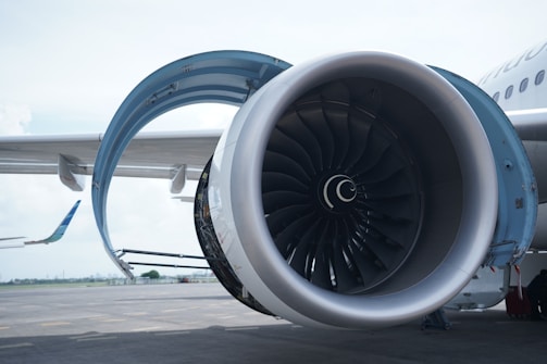 a large jet engine sitting on top of an airport tarmac
