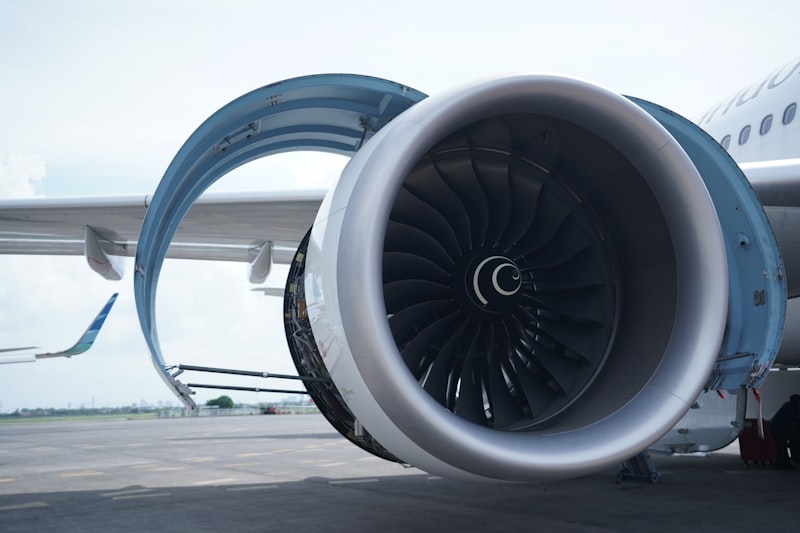 a large jet engine sitting on top of an airport tarmac
