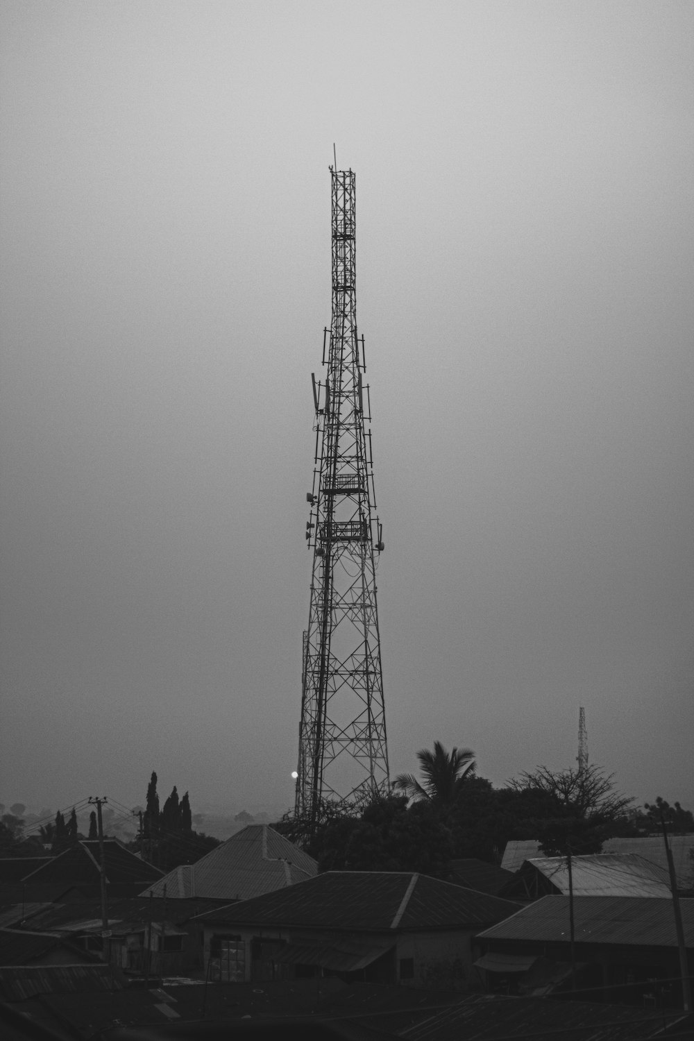 a black and white photo of a tower