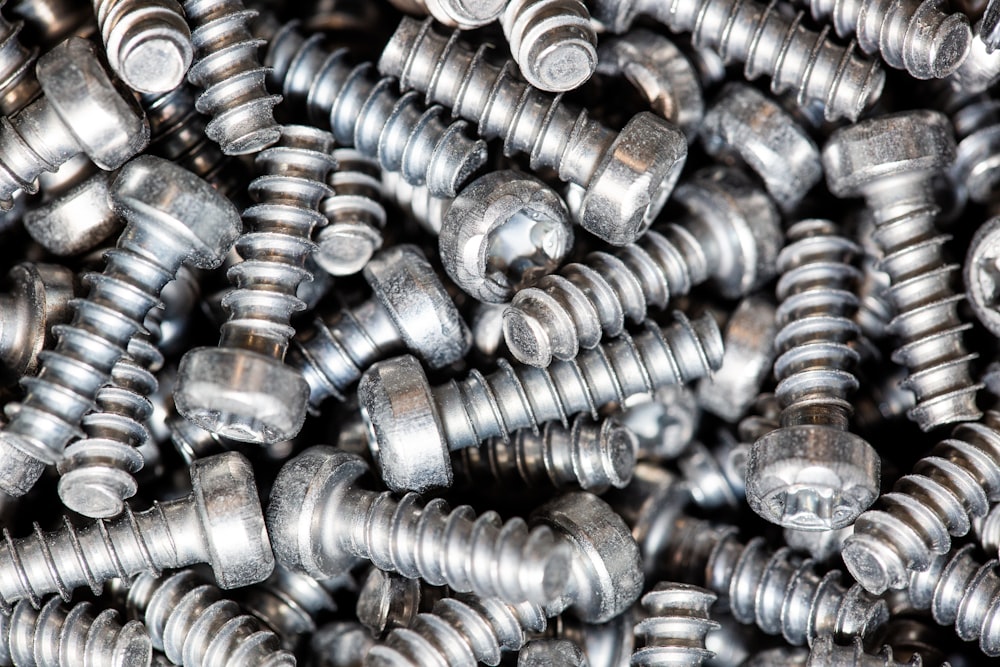 a pile of metal screws that are stacked on top of each other