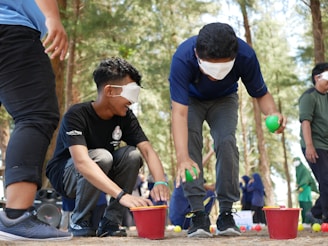 a group of young men playing a game of juggling