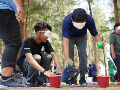 a group of young men playing a game of juggling