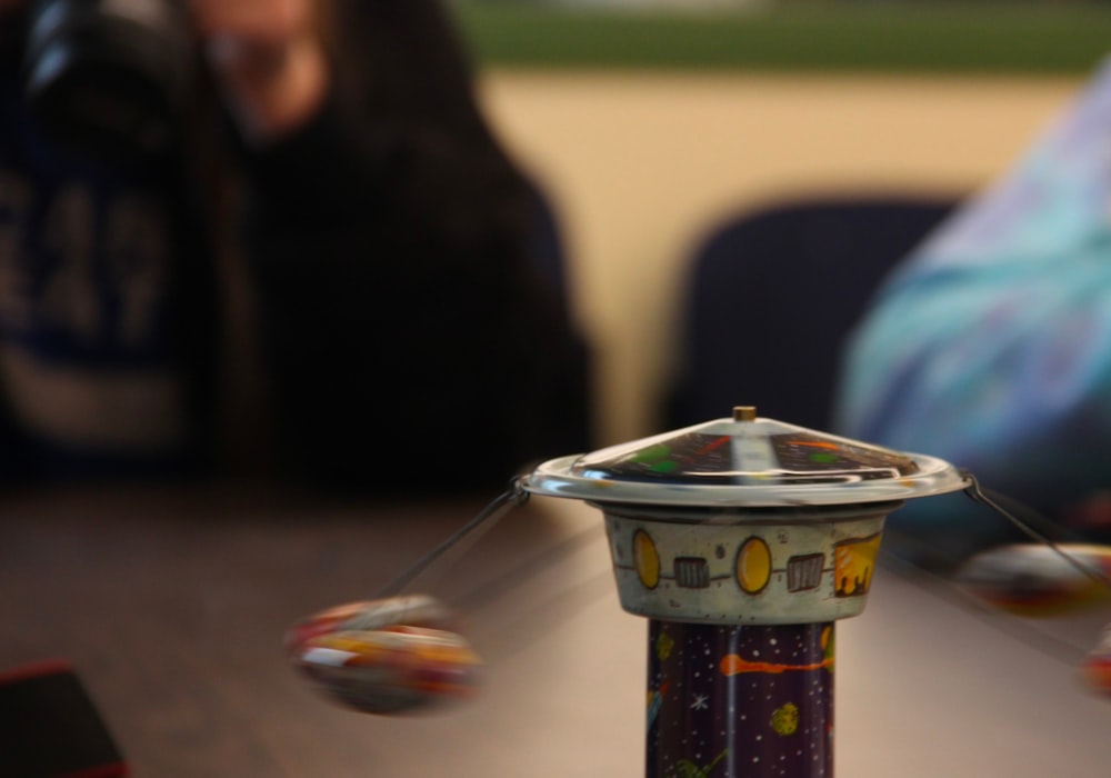 a close up of a spinning object on a table