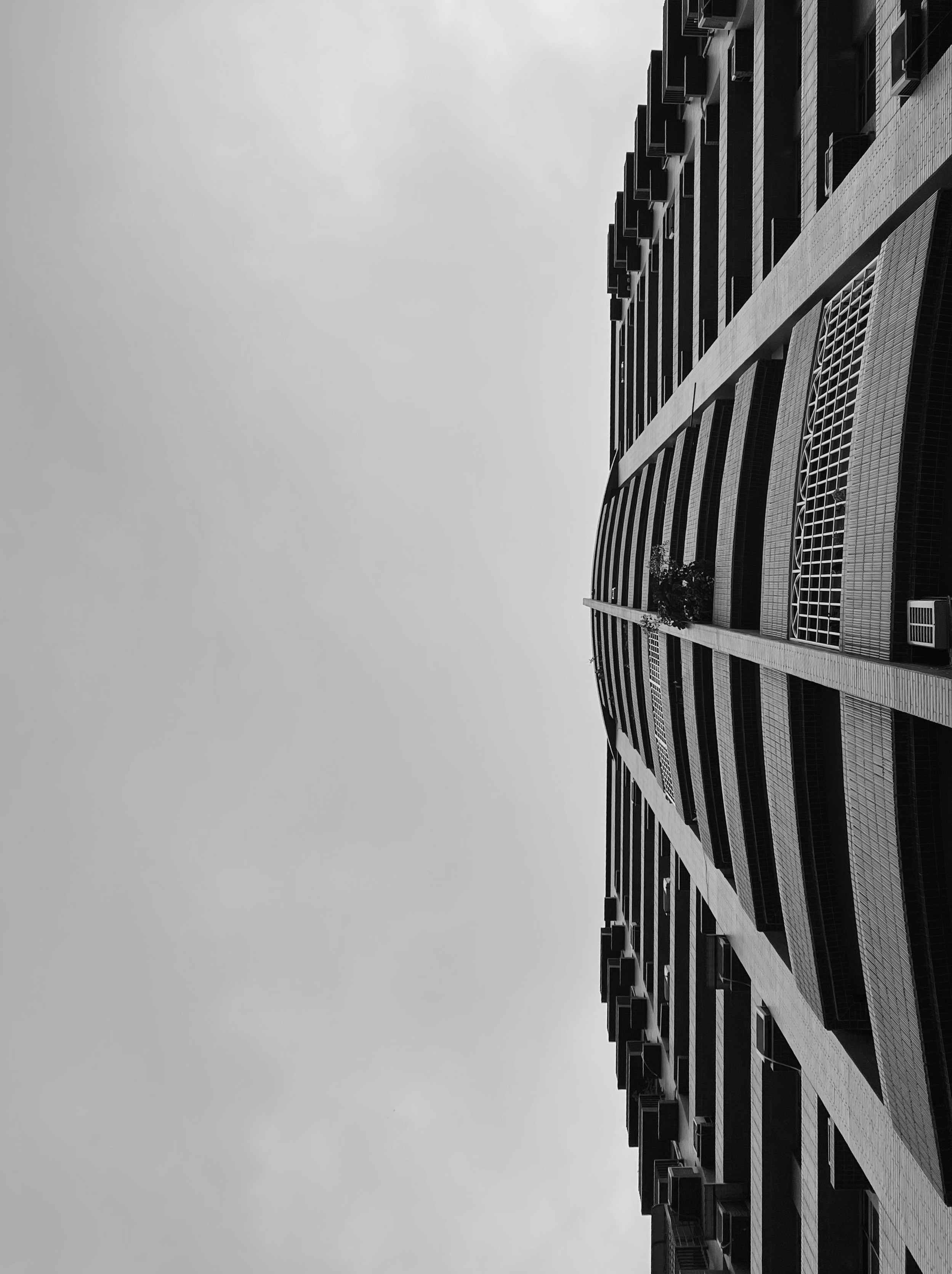 a black and white photo of a tall building