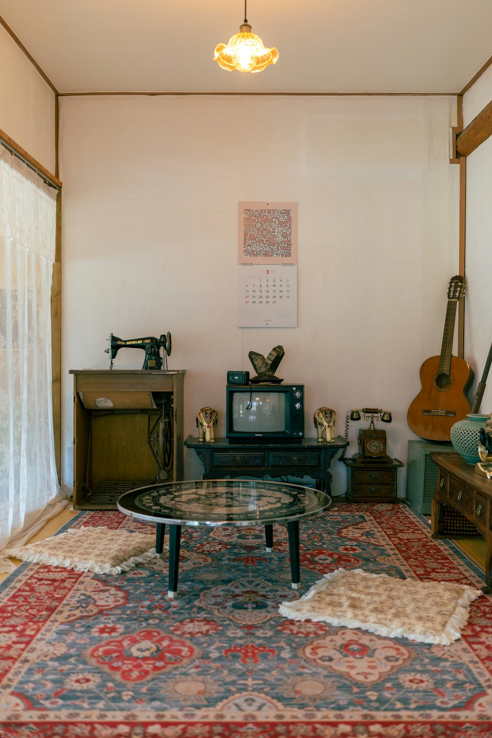 a living room filled with furniture and a tv