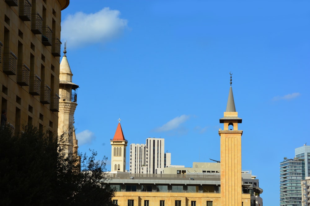 a tall building with a clock on the top of it