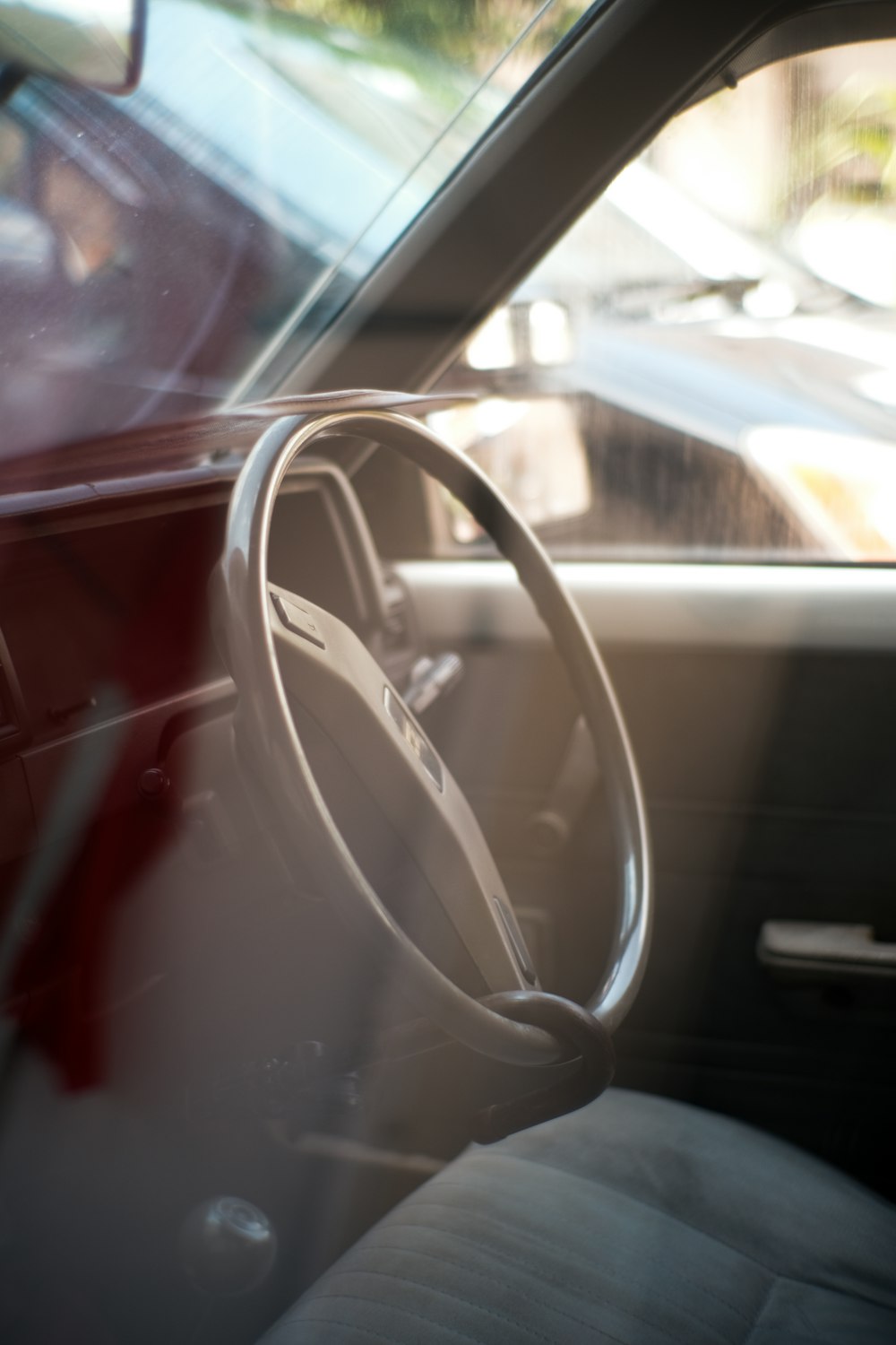 the interior of a car with a steering wheel