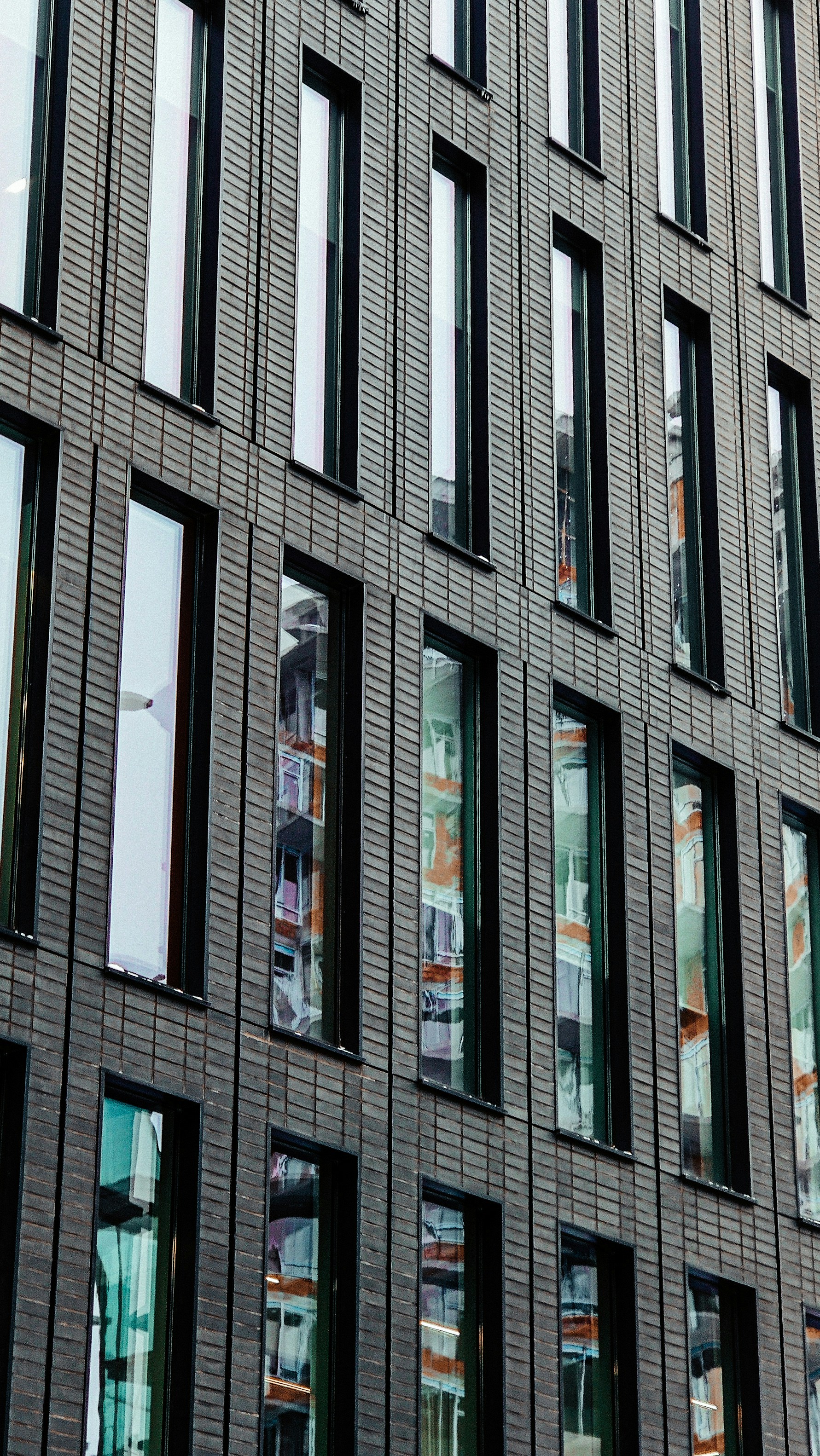 a large building with many windows and a clock
