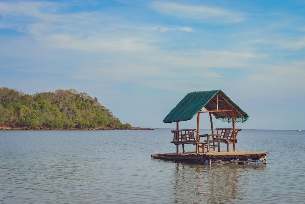 a boat floating on top of a body of water