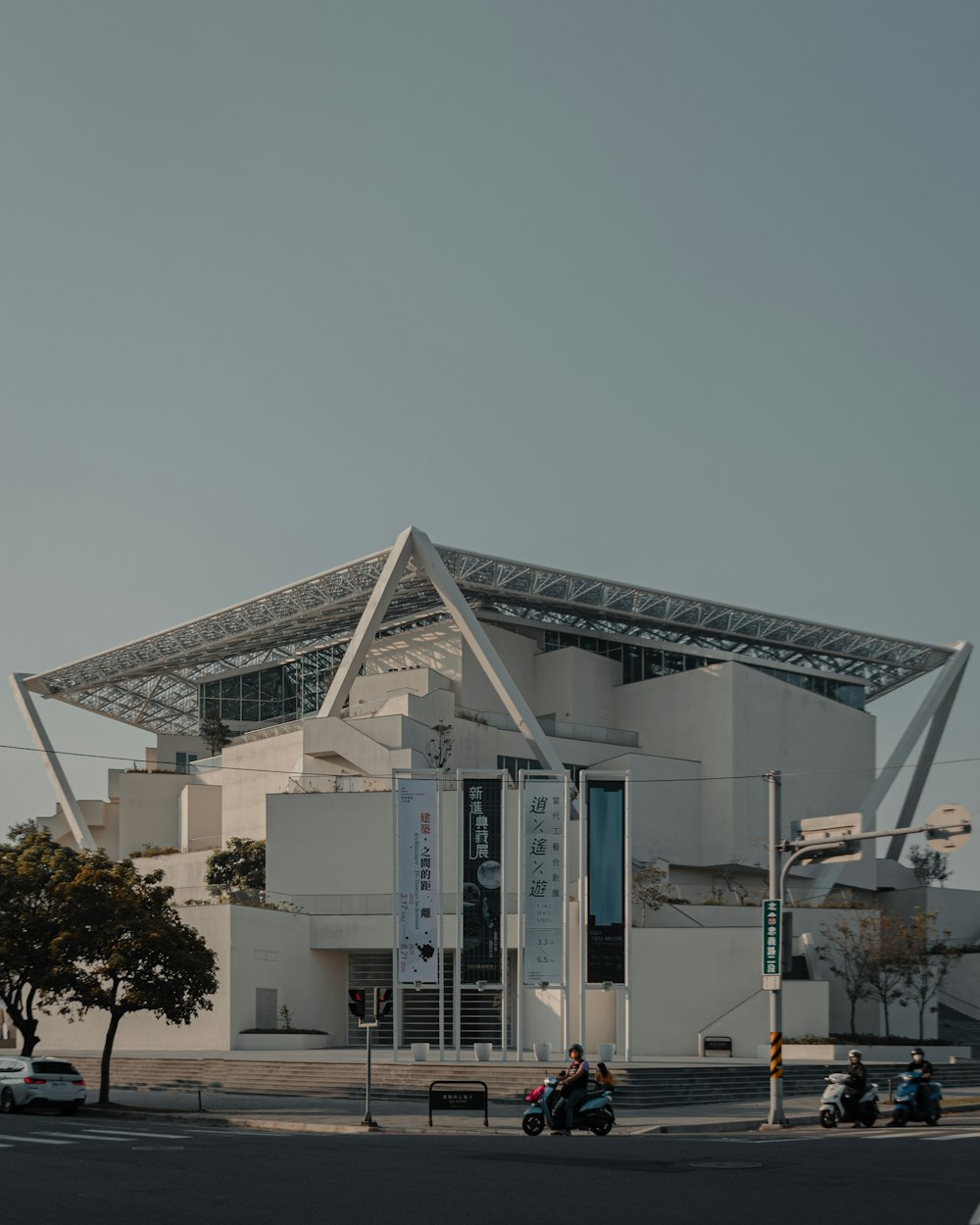 a large white building with a tall roof