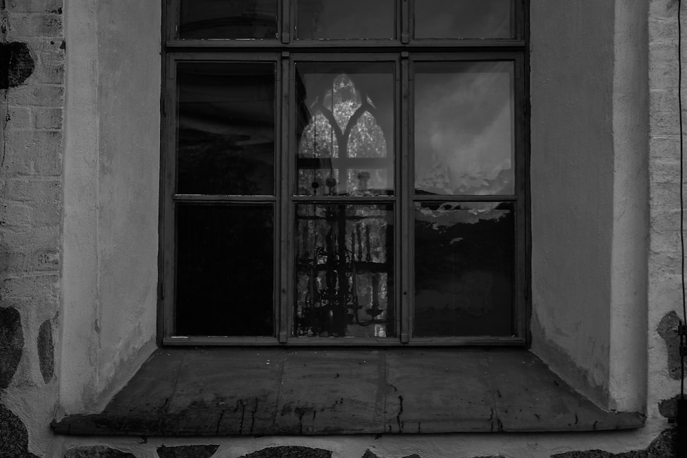 a black and white photo of a window