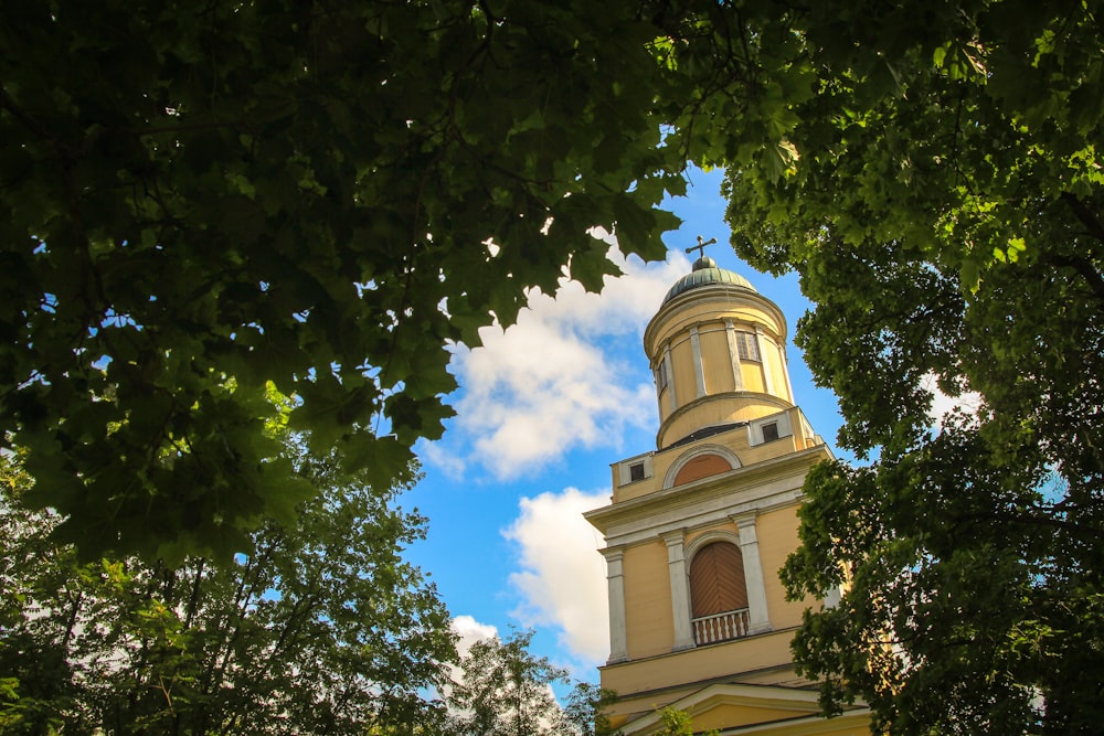 a tall tower with a clock on the top of it