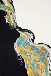 an abstract painting with black and yellow colors