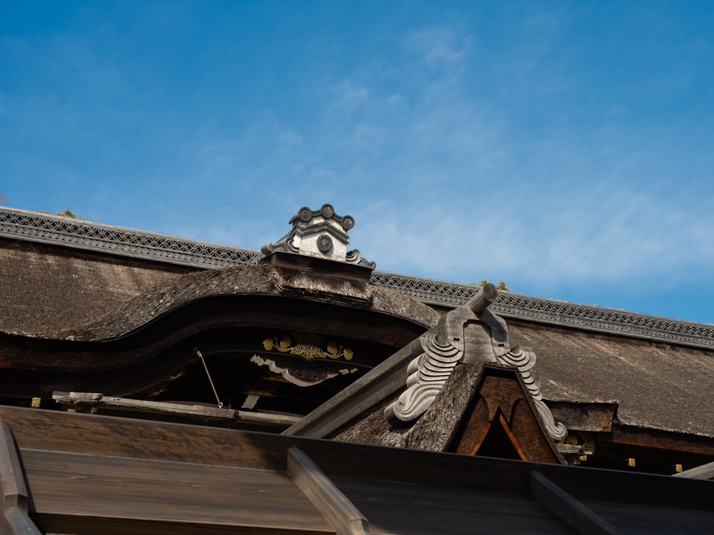 the roof of a building with a clock on it