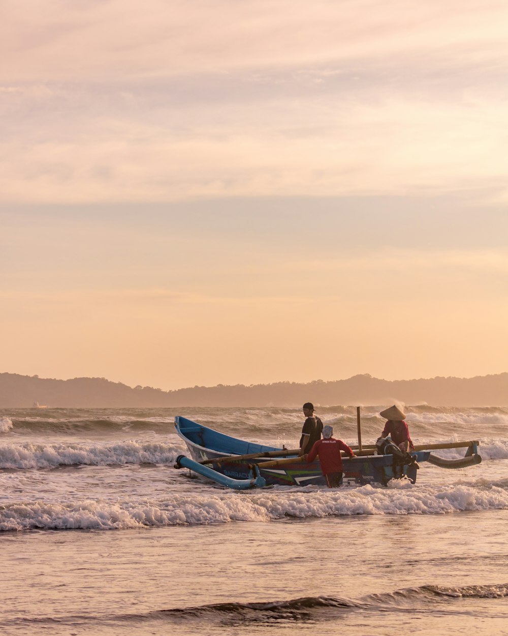 a couple of people in a small boat in the water