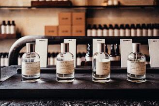 a row of bottles sitting on top of a counter