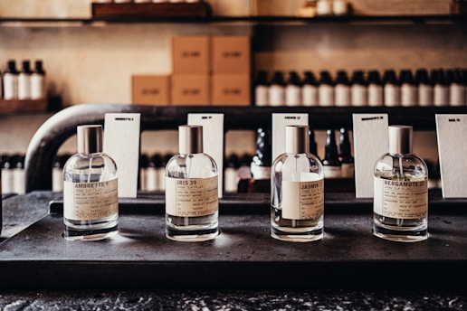 a row of bottles sitting on top of a counter