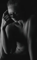 An old black-and-white photo capturing a moment of quiet reflection.