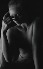 An image depicting a person in a reflective pose, symbolizing inner clarity.