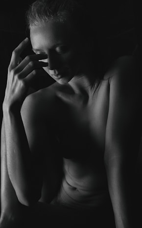 An artistic black and white photo of Logan in a contemplative mood.