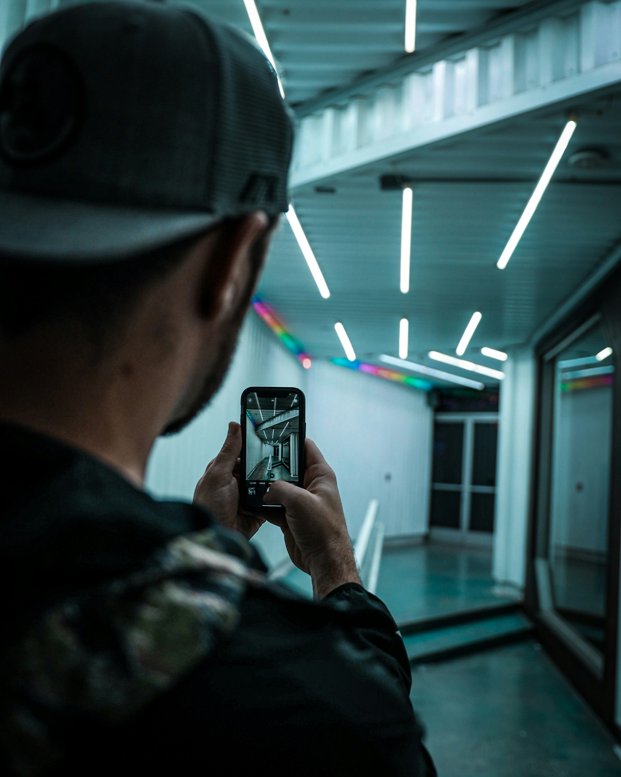 a man taking a picture of himself with his cell phone