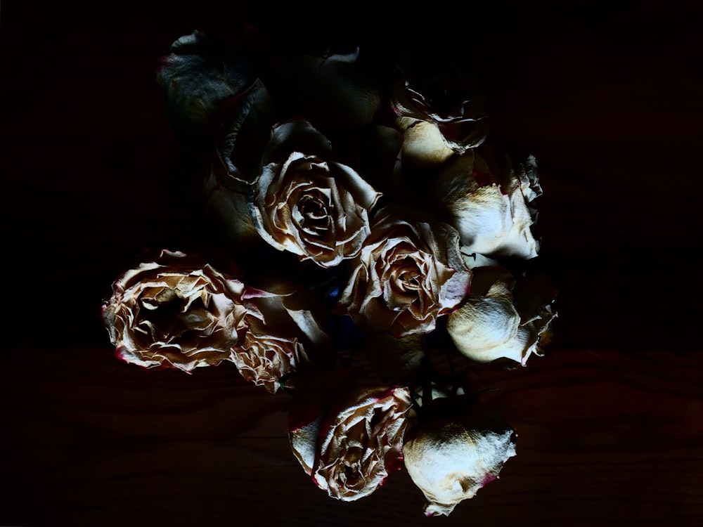 a bunch of flowers that are sitting on a table