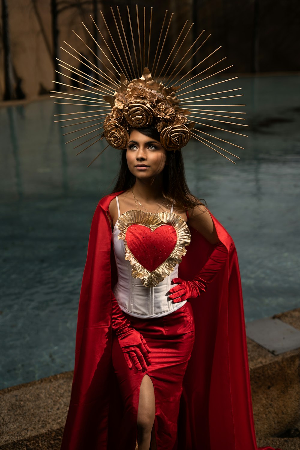 a woman dressed in a costume with a heart