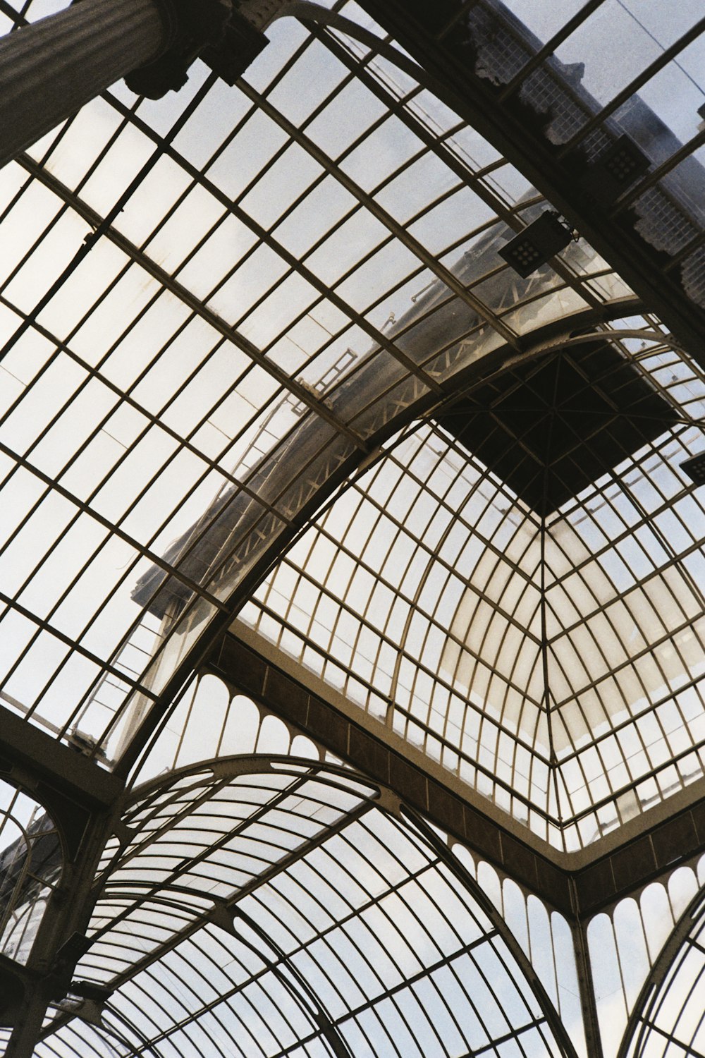 a view of the ceiling of a train station