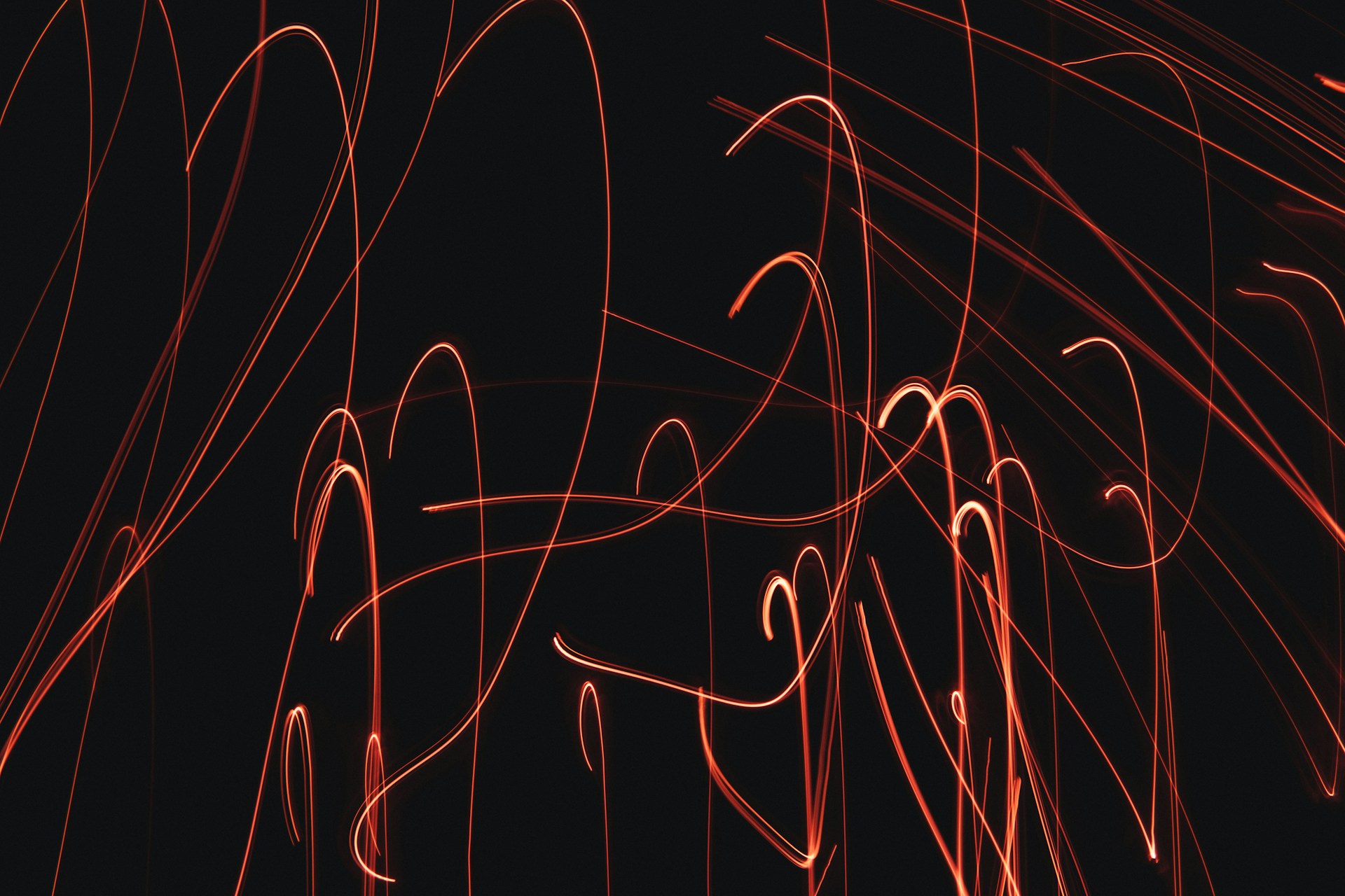 a black background with red lines in it
