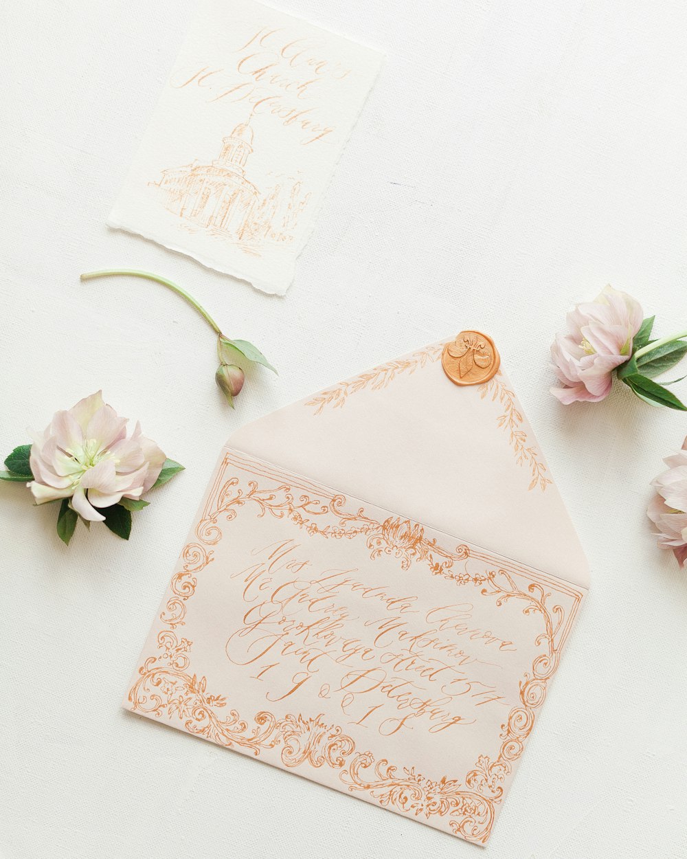 a close up of a wedding stationery on a table