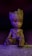 A small wooden figure resembling a humanoid tree sits against a dark purple background. The figure has detailed textures mimicking bark and leaves, with a focus on its large, expressive eyes and small hands.