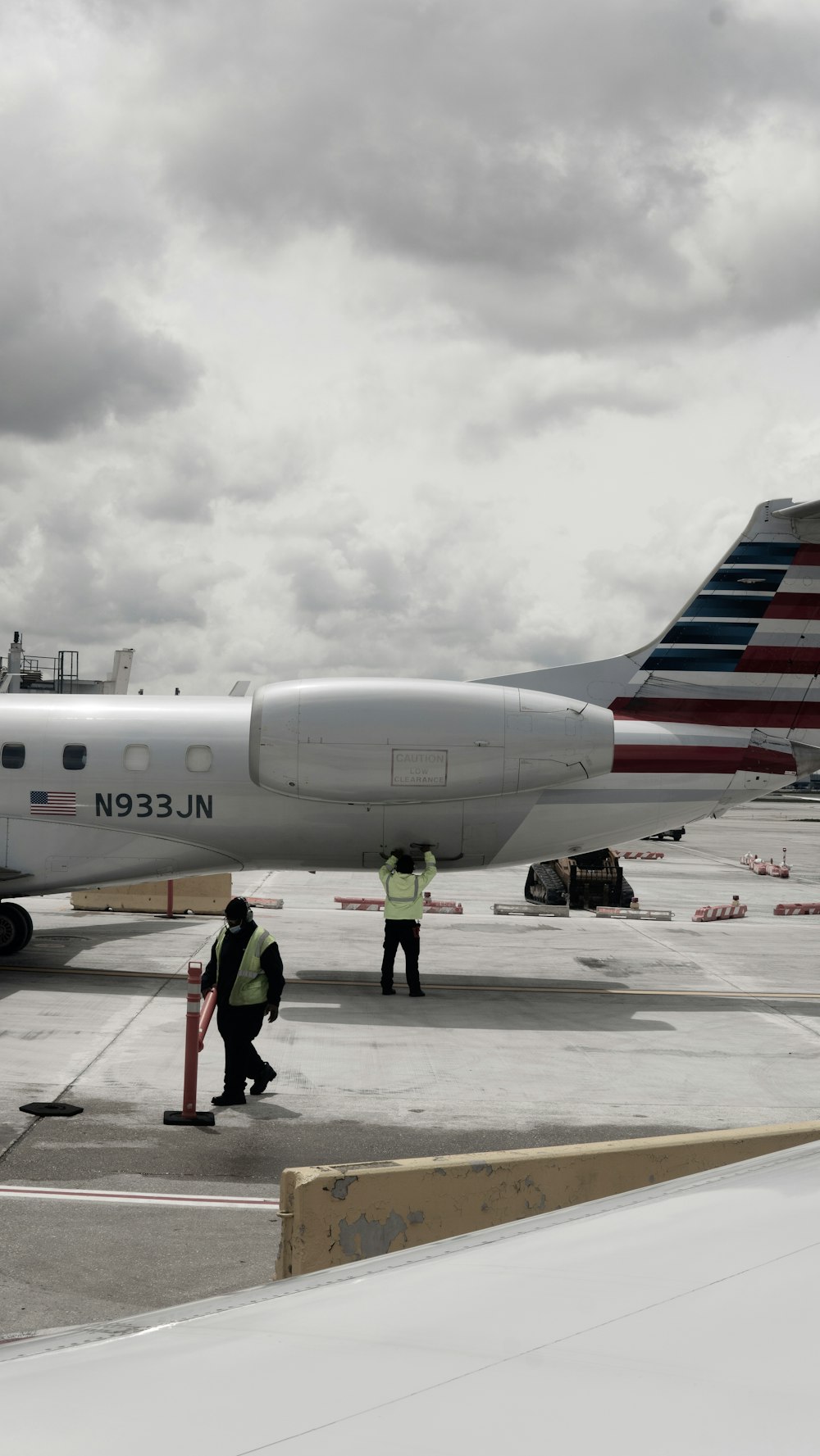 a large jetliner sitting on top of an airport tarmac