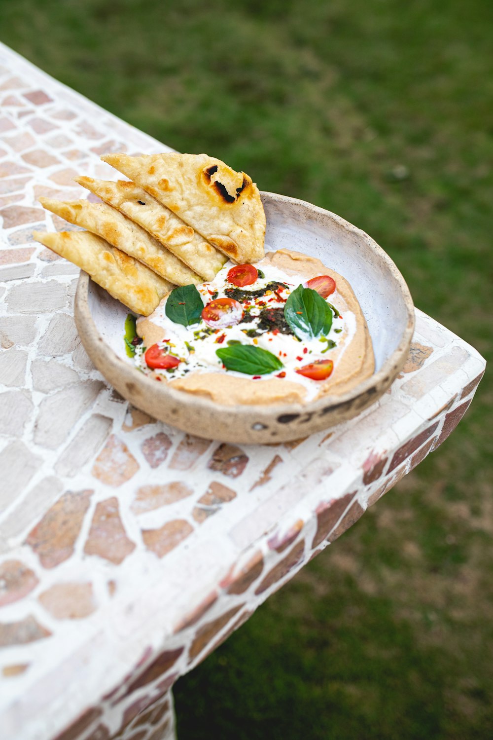 a plate of food sitting on top of a table