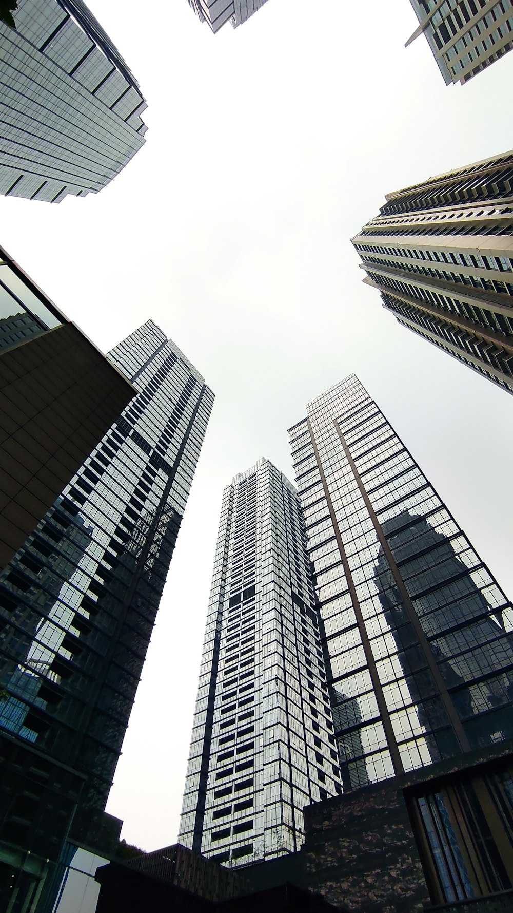 a group of tall buildings in a city