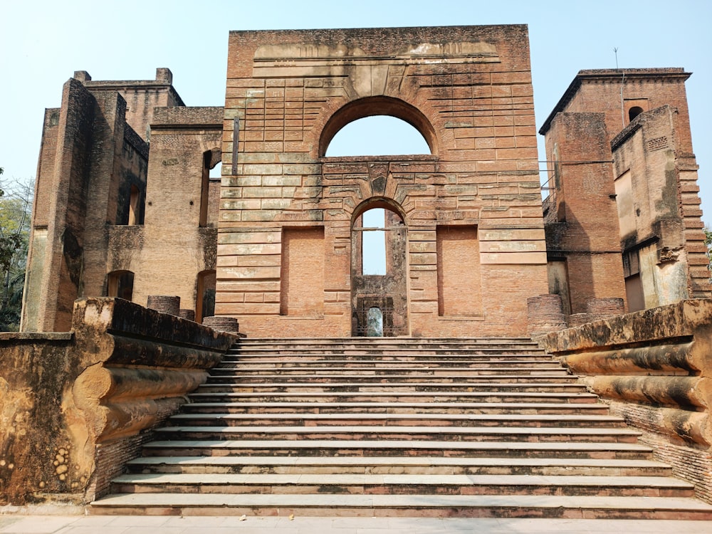 a stone staircase leading to an old building