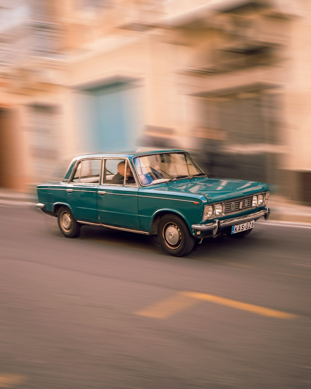 a car driving on a city street