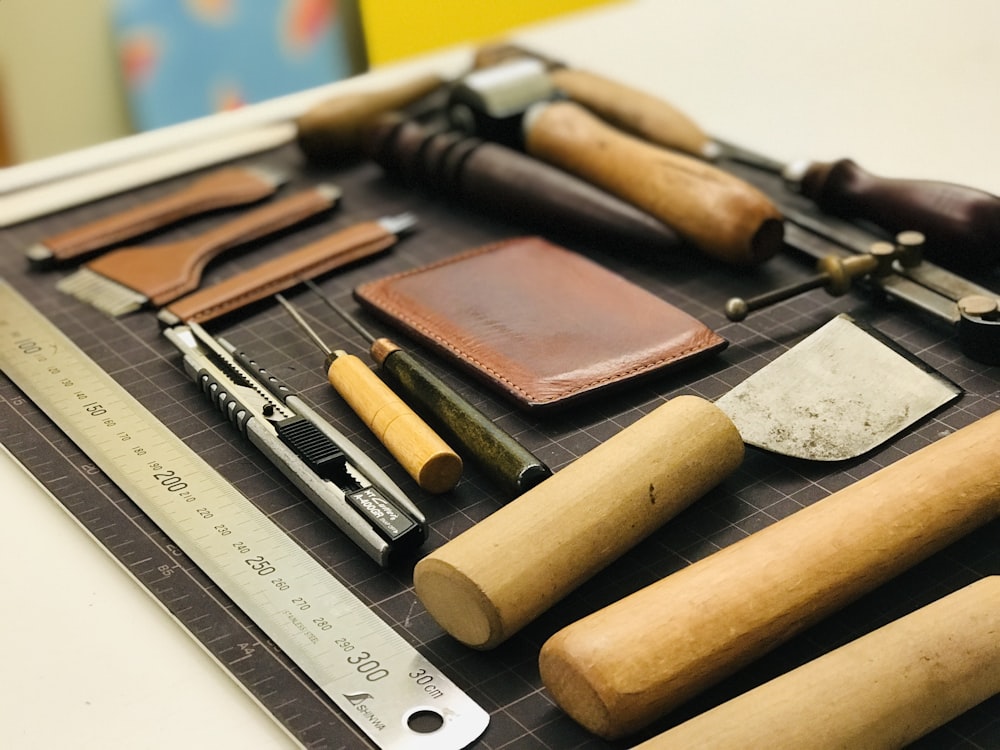 a bunch of tools are laying out on a table