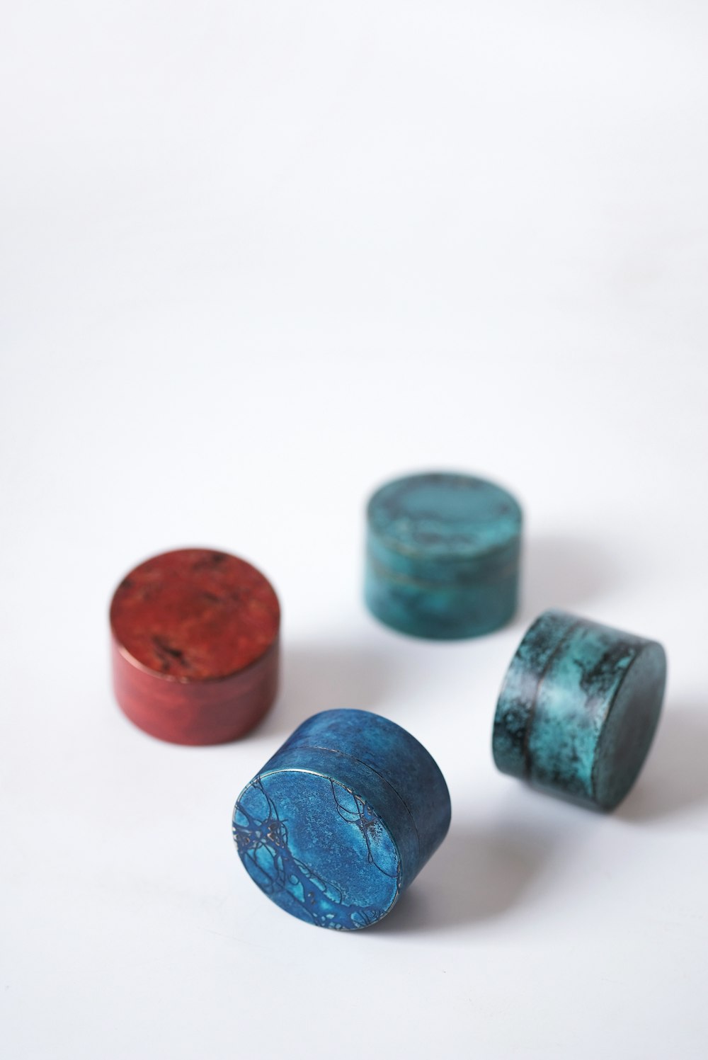 a group of three wooden containers sitting on top of a white table