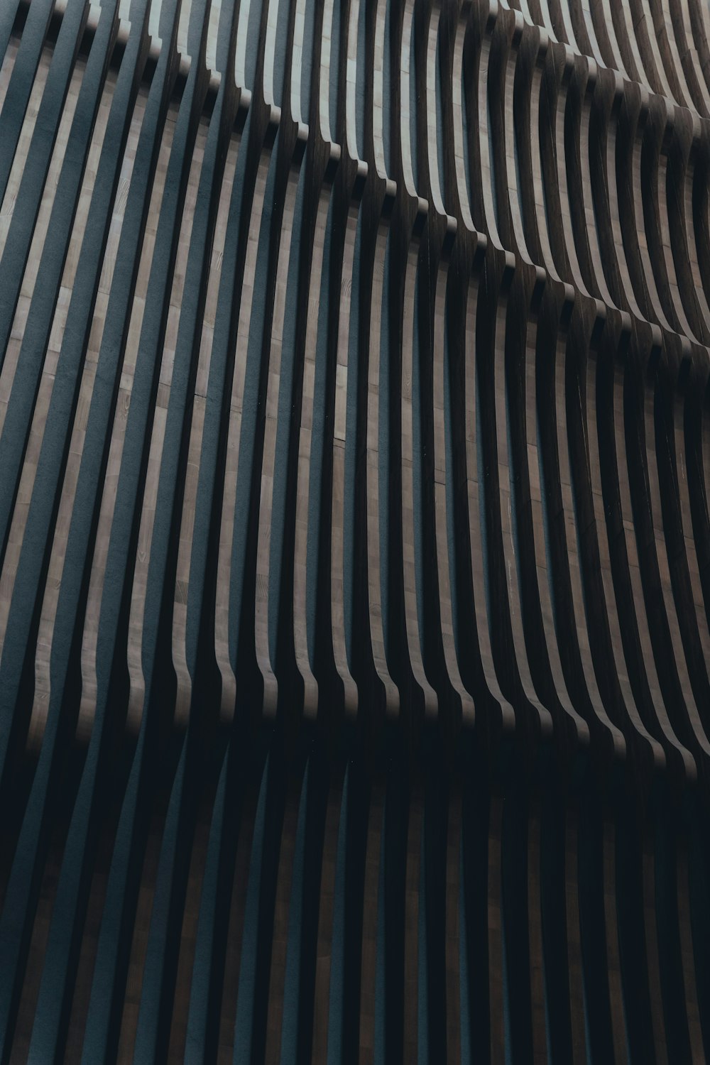 a close up of a building with wavy lines on it