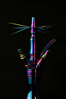 A beautifully designed hookah pipe with intricate Turkish patterns and colors.