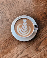 Freshly brewed coffee served with a delicate latte art on top.