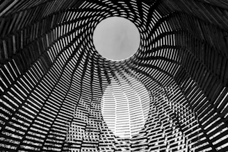 a black and white photo of a circular structure
